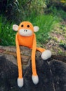 Knitted lonely monkey, symbol of year 2016