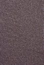 Knitted mauve background. Knitted purple textiles for text. The texture of a wool sweater. Purple, violet, lavender. Royalty Free Stock Photo