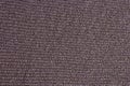 Knitted mauve background. Knitted purple textiles for text. The texture of a wool sweater. Royalty Free Stock Photo