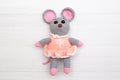 A knitted mouse. A soft toy as a symbol of the New Year Royalty Free Stock Photo