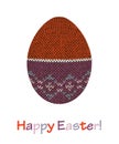 Knitted orange and violet holiday symbol Easter egg with greeting text Happy Easter Royalty Free Stock Photo