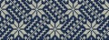 Knitted pattern on a blue background. Ornament. Border. Seamless sample