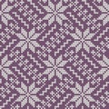 Knitted pattern on a purple background. Ornament. Seamless sample