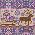 Knitted pattern with reindeer and sleigh Royalty Free Stock Photo