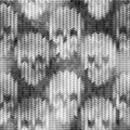 Knitted pattern with the skulls and melange effect Royalty Free Stock Photo