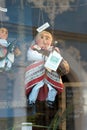 Knitted puppet on a shop window in Bamberg, Germany