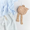 Knitted purse, clutch, wallet aand striped pants and blue blouse