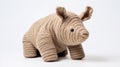 Knitted Rhinoceros Toy: Unique And Detailed Stuffed Animal
