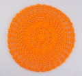 knitted round or handmade knitted rug on background. Royalty Free Stock Photo