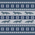 Knitted scandinavian seamless ornament with a running fox and snowflakes