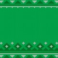 Knitted seamless green Christmas pattern with traditional ornament