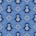 Knitted seamless pattern with penguins and scandinavian ornament. Sweater background