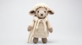 Knitted Sheep Toy With Beige Eyes And Wool Jacket