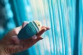 Knitted small fish in the hand. Royalty Free Stock Photo