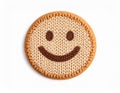 Knitted Smiley Face Cookie on White Background Royalty Free Stock Photo