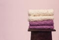 Knitted things made of natural wool stacked in a pile Royalty Free Stock Photo
