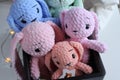 Knitted toys are located on the shelf. Toys at the fair. Handmade. Knitting. Hobby. Kids toys. Gifts for the New