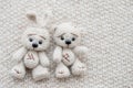 Knitted white hare and bear