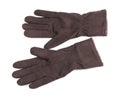 Knitted woolen brown gloves on a white background