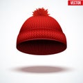 Knitted woolen cap. Winter seasonal red hat.