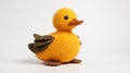 Knitted Yellow Duck Toy With Brown Wings - Modern And Sleek Design