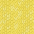 Knitted yellow seamless pattern. Natural warm knitted fabric. Winter woolen clothes. Hand drawn seamless background. Royalty Free Stock Photo