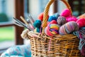 knitters basket filled with colorful wool skeins and tools