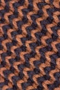 Knitting. Background knitted texture. Bright knitting needles. Black and brown woolen yarn for knitting Royalty Free Stock Photo