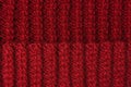 Knitting canvas texture. Red or burgundy color Royalty Free Stock Photo