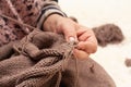 Knitting close-up. Stock photo female hands knit a sweater