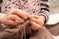 Knitting close-up. Stock photo female hands knit a sweater