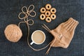 Knitting with coffee and ring-shaped cracknels Royalty Free Stock Photo