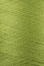 Green wool thread spool macro close up Royalty Free Stock Photo