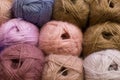 Knitting needles, colorful threads, beige colors