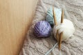 Knitting needles, yarn, knitting and knitted fabric. Space for text, copy-space Royalty Free Stock Photo