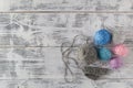 Knitting needles and yarn on wooden background/natural wool knit