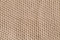 Knitting pattern of wool. Knitting. Texture of knitted woolen fabric for wallpaper and an abstract background Royalty Free Stock Photo
