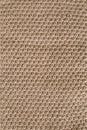 Knitting pattern of wool. Knitting. Texture of knitted woolen fabric for wallpaper and an abstract background Royalty Free Stock Photo