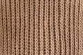 Knitting pattern of wool. Knitting. Texture of knitted woolen fabric for wallpaper and an abstract background Royalty Free Stock Photo