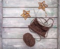 Knitting pattern from woolen brown yarn on knitting needles with fishing line and skein