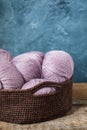 Pink wool yarn in the crocheted basket Royalty Free Stock Photo