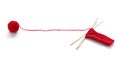 Knitting a red yarn ball with noodles Royalty Free Stock Photo