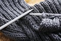 Knitting scarf close up Royalty Free Stock Photo