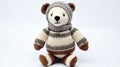 Whistlerian Knitted Bear Toy In Dark Beige And White