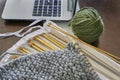 Knitting thread and needle case and laptot Royalty Free Stock Photo