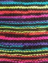 Knitting up close bright neon colors with texture and detail