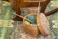Knitting in Wicker Basket on Floor Royalty Free Stock Photo