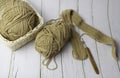 Knitting work with wood crochet hook and brown cotton yarn Royalty Free Stock Photo