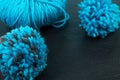 Knitting yarn for knitting on background. pompon. fluffy soft pompon made of yarn