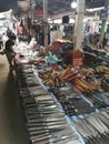 Knives and metal tools on sale in Sanpatong buffalo market in Chiang Mai Thailand.